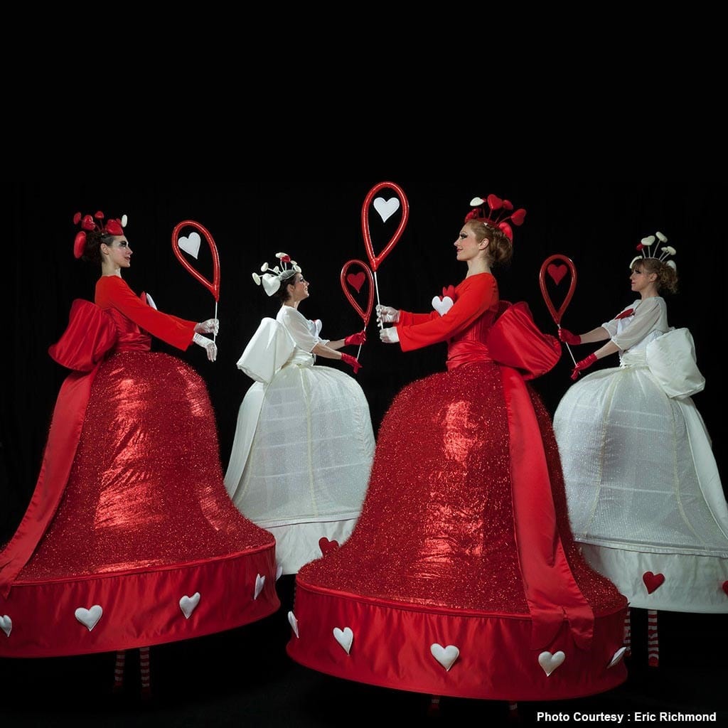 Stilt walkers in Valentines costumes